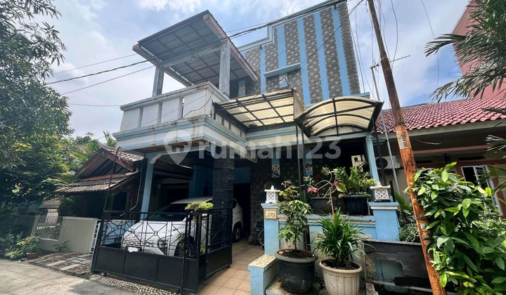 tampak depan rumah bebas banjir di titian