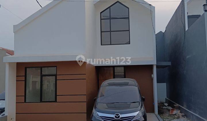 Rumah Mezzanine Bebas Banjir Di Depok , Bonus Mesin Cuci 1