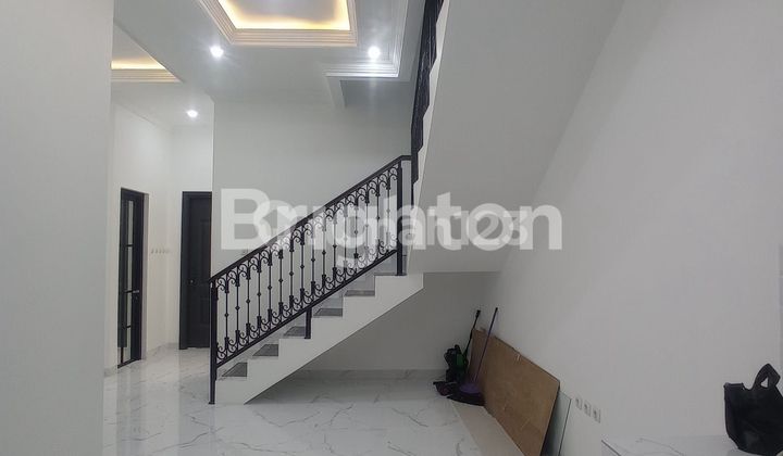 HOUSE IN A CLUSTER IN TANAH BARU 2