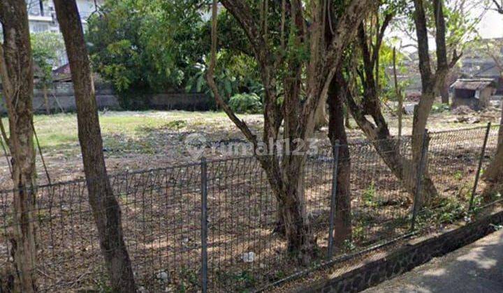 Land with full sea and sunset view in front of Jimbaran beach 1