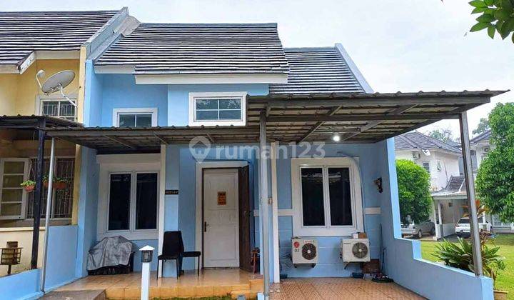 Rumah dengan Taman Luas di Perumahan Kota Wisata Kpr Mudah 1