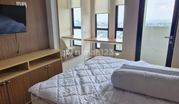 tampak depan apartement nyaman siap huni di