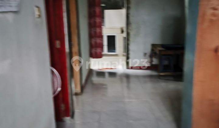 Minimalist house with motorcycle access for sale in Purwokerto.