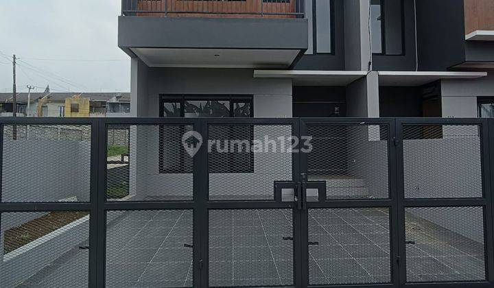 Rumah Modern Minimalis 2 Lantai Baru Unfurnished SHM di Geger Kalong, Bandung 1