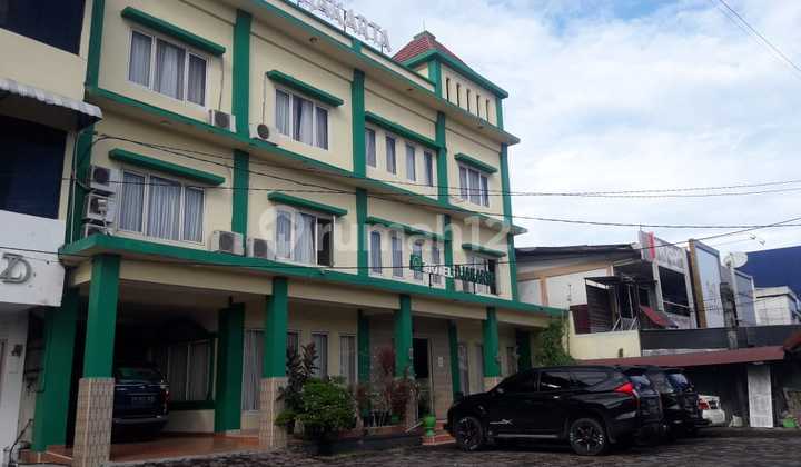 For sale. 4-story hotel with 70 rooms in Padang city, West Sumatra.