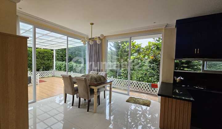 ruang keluarga rumah cantik rancamaya golf estate