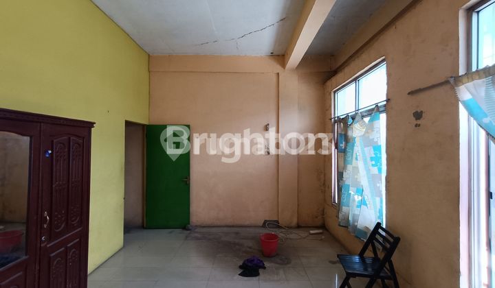 2.5-story shop house in a complex 2