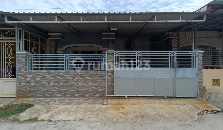 Rumah Minimalis Lokasi Strategis Plus Pagar Kanopi