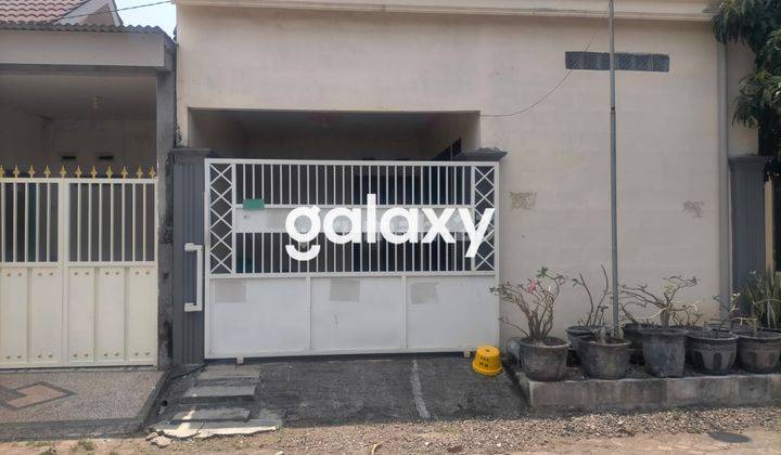 tampak depan rumah murah di permata green