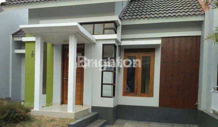 RUMAH DI DALAM PERUMAHAN YANG ASRI 1