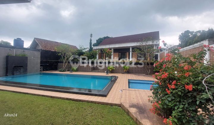 A LUSH AND COMFORTABLE VILLA WITH SWIMMING POOL IN CARINGAN, BOGOR