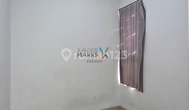 Minimalist House in Austinville, Dieng Malang  Additional 4m land area at the back, fully paved with a full canopy. 2