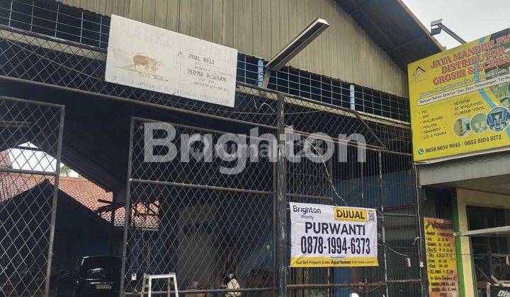 di jual cepat rumah  /ruko beserta kontrakan  pinggir jalan lokasi sangat strategis 1