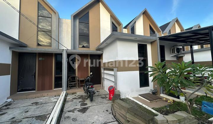 Dikontrakan Rumah Cluster Sudah Berpenghuni Fasilitas Kolam Renang 2