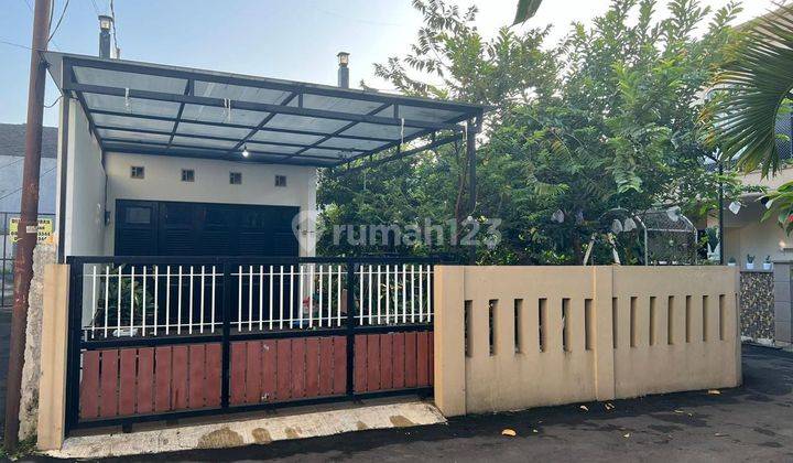 Tanah dengan Bangunan di Tanah Baru Akses Tol Kukusan Depok 1
