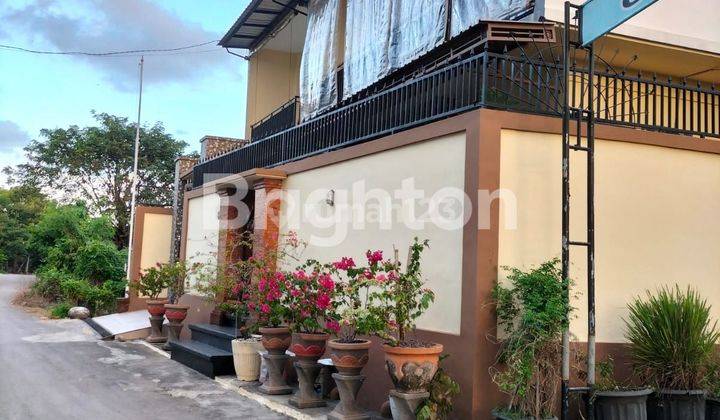 2 STOREY CORNER HOUSE WITH ROOF TOP IN MUNGGU 1