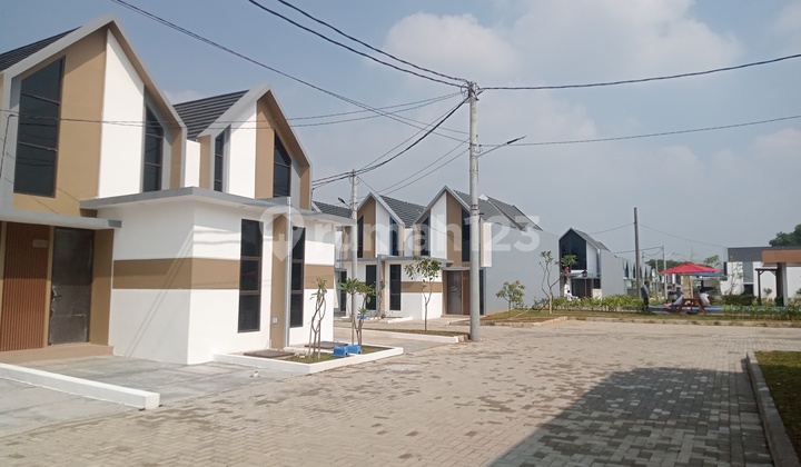 Rumah 1 Lantai Dengan Fasilitas Kolam Renang Di Cluster Safira Aryana Karawaci Tangerang
