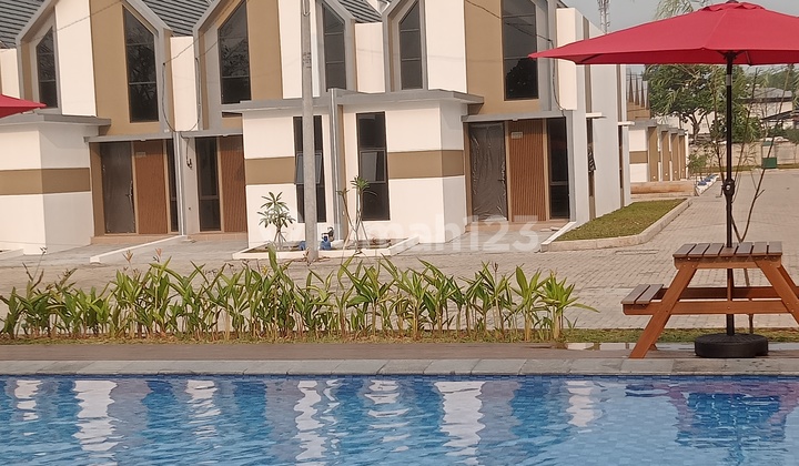 Rumah Murah Dengan Fasilitas Kolam Renang Di Cluster Safira Aryana Karawaci Tangerang