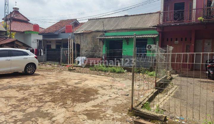 Tanah Mengantong di Jalan Mushola Al Barokah Graha Raya Dengan Akses Mobil 1