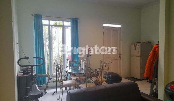 A neat and beautiful one-story house on a large plot of land with a lush garden in Bogor. 2