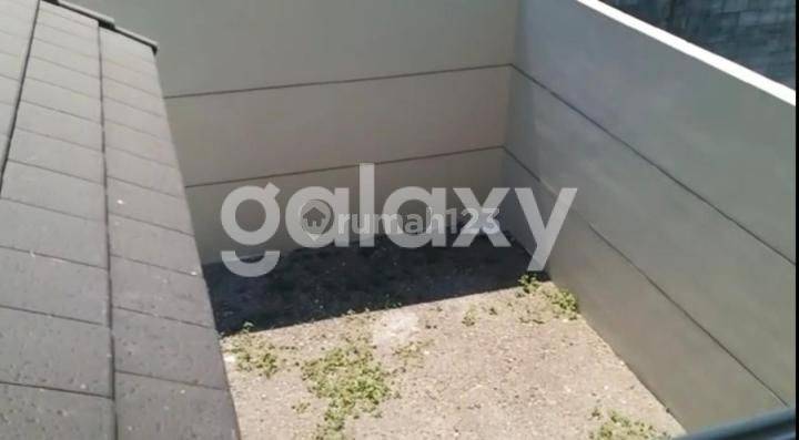 tampak depan rumah grand harvest cluster arcadia