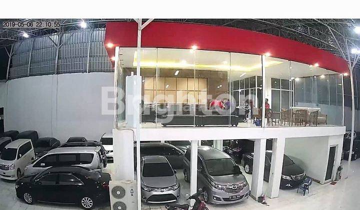 gedung ex showroom mobil dimensi. jln raya Husein sastro negara 2