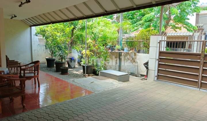 Rumah Terawat di lingkungan yang tenang 