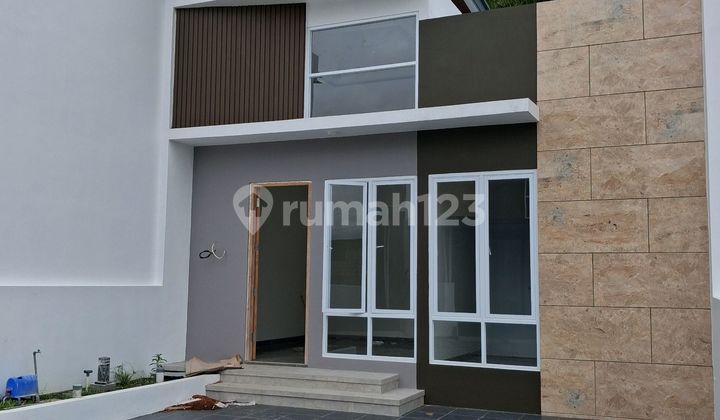 Rumah Siap Huni Nyaman Dalam Perumahan Nuansa Pedesaan