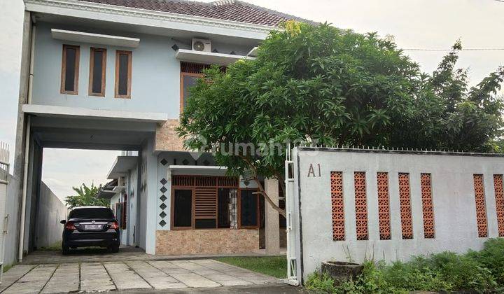 Rumah 2 Lantai Dengan Halaman Kebun Luas 1