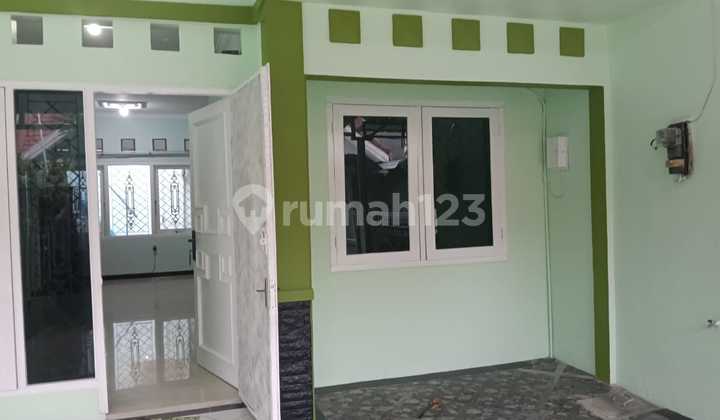 Semi-Furnished 2-Story House in a Strategic Location at Graha Padma 1
