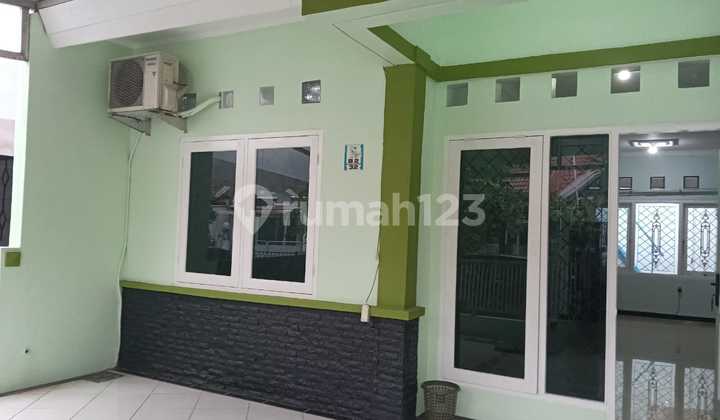 Semi-Furnished 2-Story House in a Strategic Location at Graha Padma 2