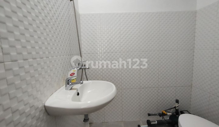 S869.Hunian 2 Lt Siap Huni dg Konsep Industrialis Modern di Depok 2