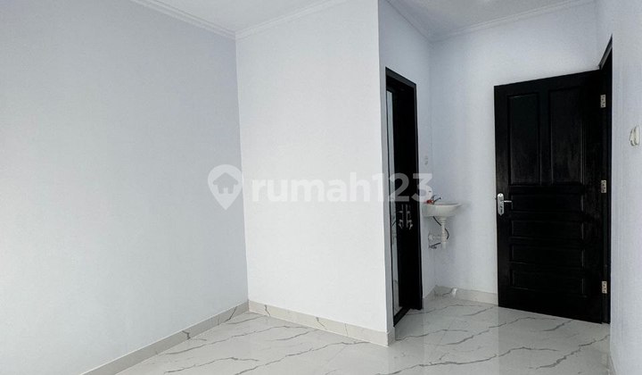 Affordable Modern Classic Housing with Complete Facilities, Gang-Free in Cimanggis 2