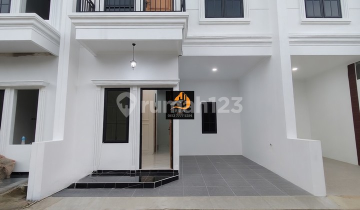 Rumah Modern Classic 2 LT Full Bata Merah di Cipayung Jaktim/T120 Rumah Modern Classic 2 LT Full Bata Merah di Cipayung Jaktim/T120