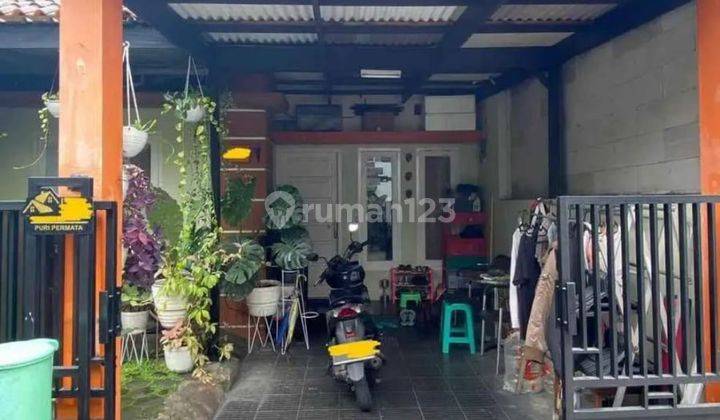 garasi/carport rumah bagus di puri permata
