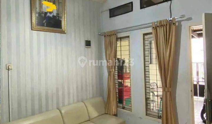ruang tamu rumah bagus di puri permata