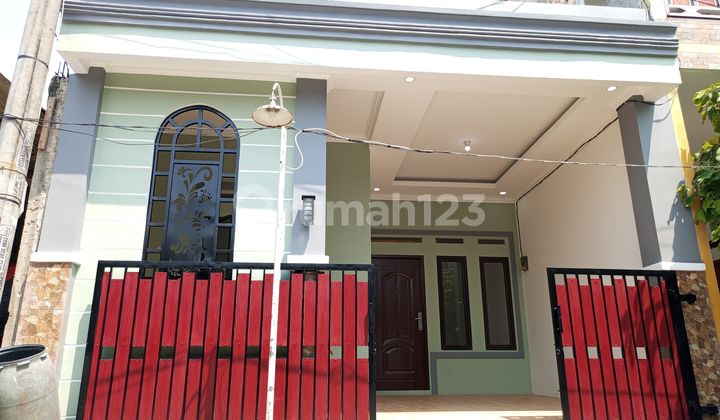 DIJUAL RUMAH MURAH DI GRAMA PURI BEBAS BANJIR FULL BANGUNAN BARU 1
