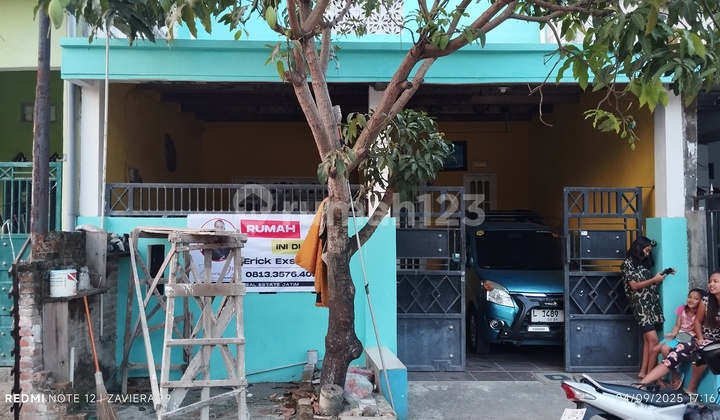 Rumah 2 Lantai Denga Lantai Mezzanine Murah