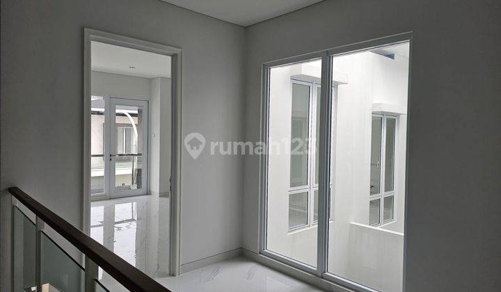 Rumah mewah modern tropis di gading serpong bsd 2