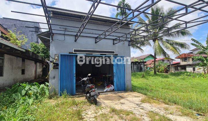 TANAH KOMERSIL DENGAN 1 UNIT KIOS LOKASI PONTIANAK KOTA COCOK UNTUK BANGUN RUMAH MEWAH, KANTOR ATAU GUDANG 2