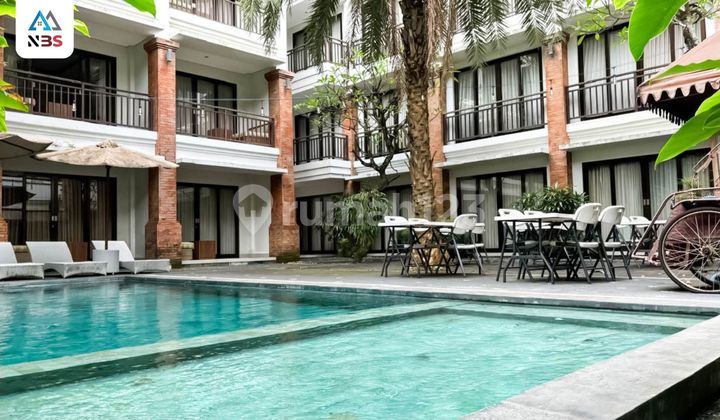 MODERN HOTEL WITH LARGE SWIMMING POOL FOR SALE IN DENPASAR