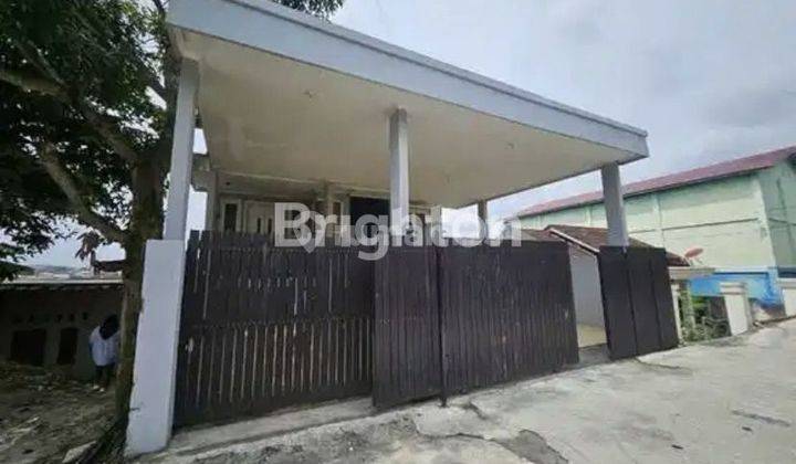 Rumah Tengah Kota  1