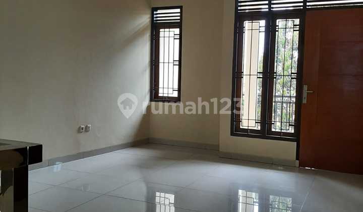 A Good, Clean, and Well-Maintained House in Graha Asih Cipamokolan Complex. 2