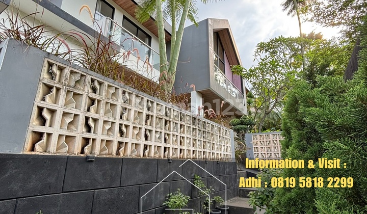 Rumah Tropis Halaman Luas Dalam Komplek Elit Bebas Banjir 2