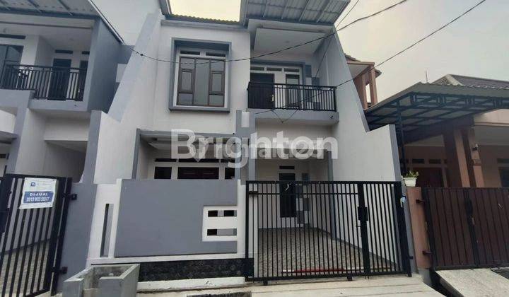 Rumah baru 2 lantai cantik harga cantik 1