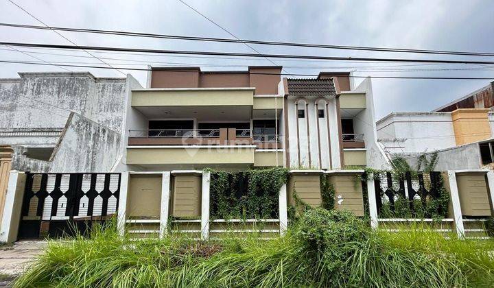 Rumah Dharmahusada Indah Row Jalan Lebar Cukup Bagus 1