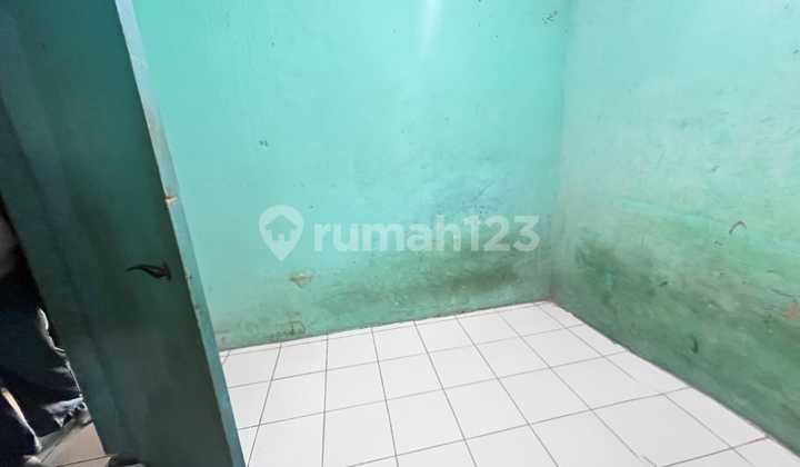 For Quick Sale: Simple House in Cikadut, Bandung. Occupied as a 4-Door Rental House, Already Active and Comfortable. Strategic Location, Can Be Used as an Investment. 2