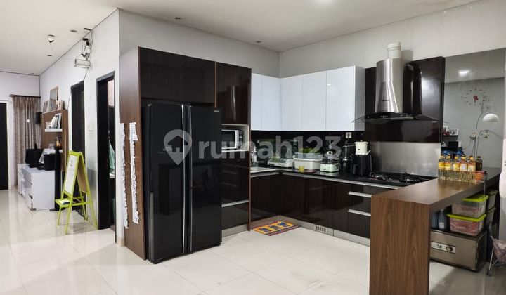 For Sale 1.5-Story House in Taman Kopo Indah 2 (Tki 2) Bandung, Comfortable and Well-Maintained, Move-In Ready, Highly Strategic Location.