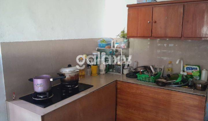 tampak depan rumah 2 lantai di mentari