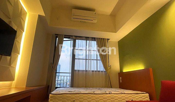 kamar tidur apartemen evenciio depok type studio